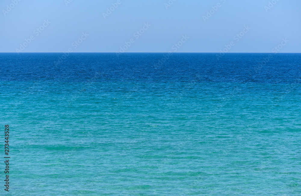 Calm blue sea and blue sky