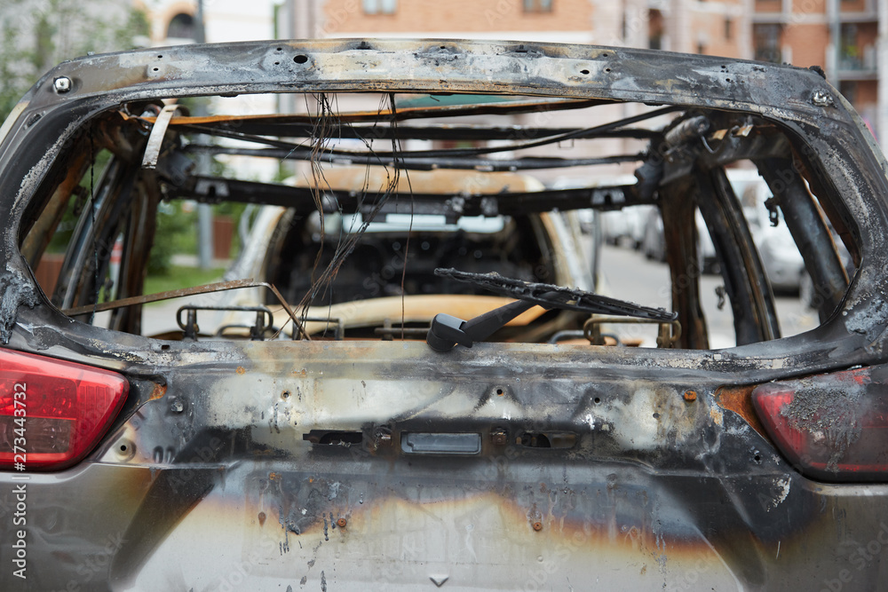 Obraz premium Burnt car. Back view. Close-up