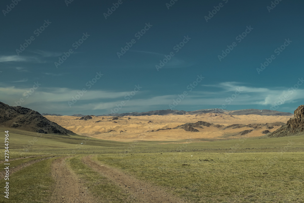 landscape with sand mountains and clouds