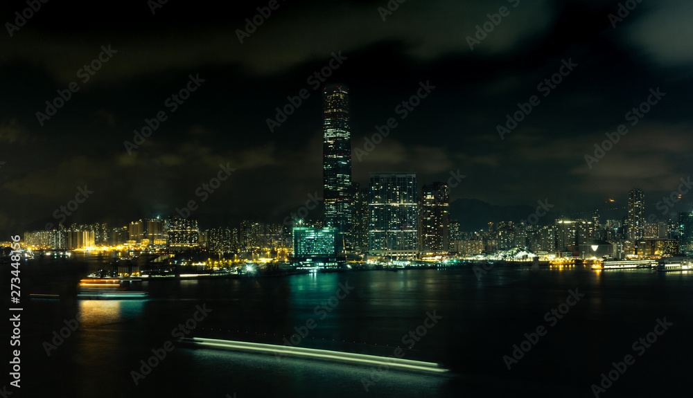 A night view of the Kowloon waterfront at night with boat light trails - 2