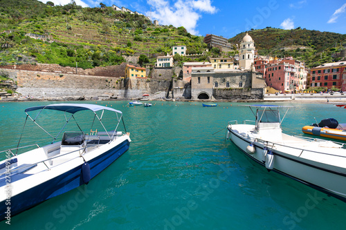 View on bay of water with moored boats, country town Vernazza, Cinque Terre, Italy © mychadre77