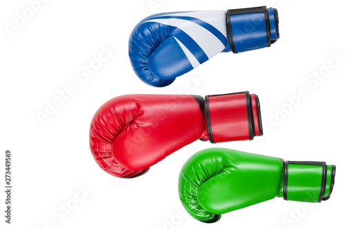 three colored boxing gloves, as if flying for a blow, concept, on a white background © aneduard