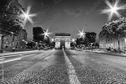 Night view of Arc de Triomphe, Paris photo