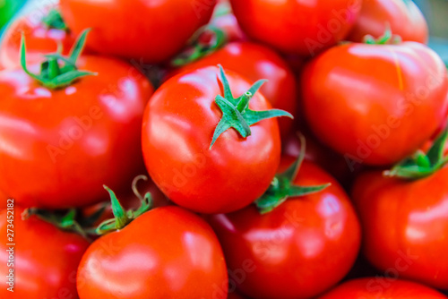 Fresh organic tomatoes on the street stall