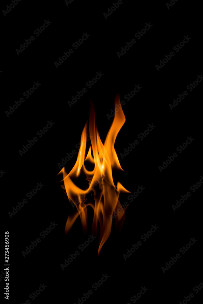 Flames with a black background. Close up. Flames with a black background. Close up.