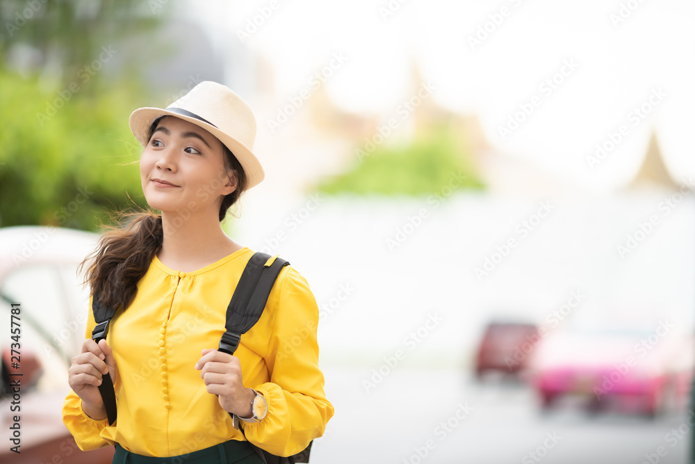 Happy woman traveling in Thailand