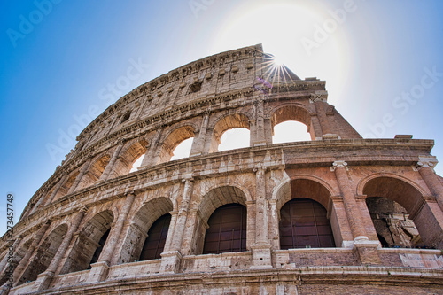 Canvas Print Ruins of Colosseum  and sunlight in Rome, Italy