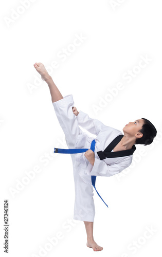 Master Blue Belt TaeKwonDo Kid show fighting pose, Asian Teenager Boy athletes exercise warm up in white uniform pants bare foots, studio lighting white background copy space