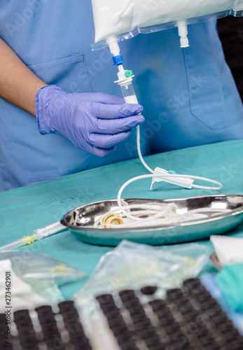 Konstfotografi Nurse preparing medication for parenteral nutrition in a hospital, conceptual im