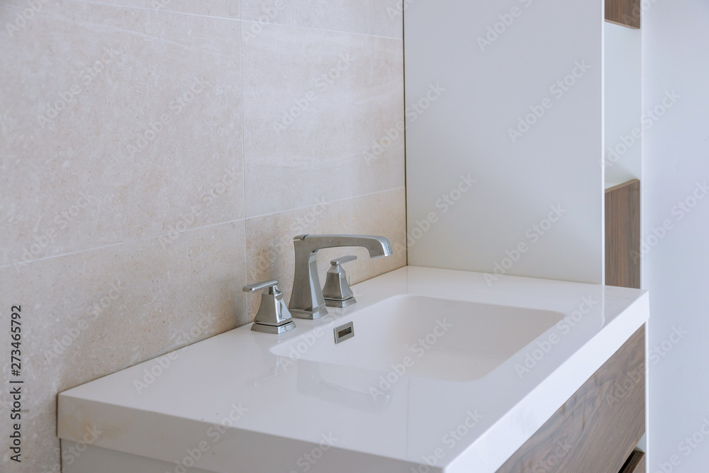 Bathroom interior with sink and faucet. Bathroom interior with sink and faucet.