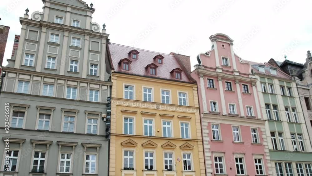 Houses in the square in the city center. Beautiful architecture. Travel to Europe Wroclaw Poland 03/16/19 Houses in the square in the city center. Beautiful architecture. Travel to Europe Wroclaw Poland 03/16/19