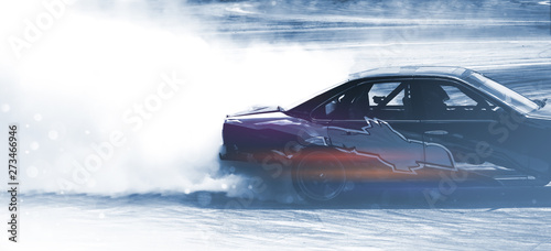 Sport car wheel drifting. Blurred of image diffusion race drift car with lots of smoke from burning tires on speed track. Sport concept,Drifting car concep © applezoomzoom