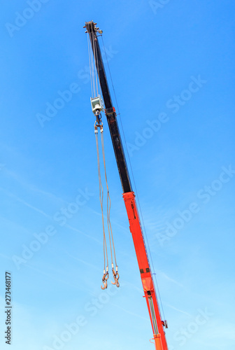 Cables on the crane against the sky © schankz