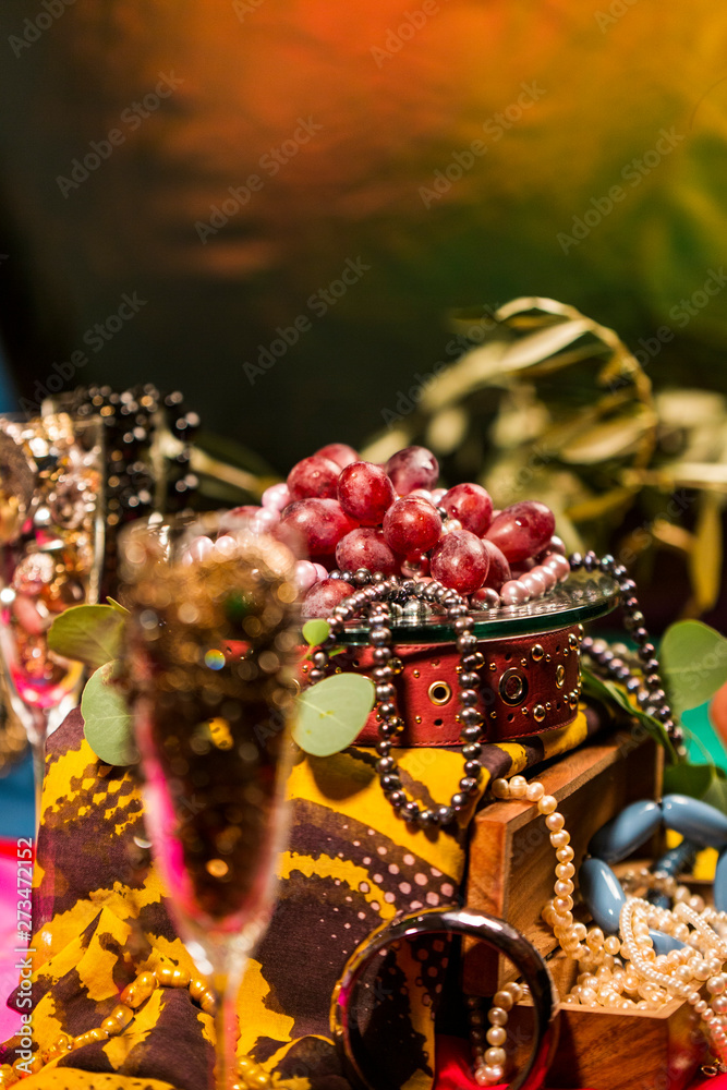 Grapes, Champagne Flutes and Jewellery