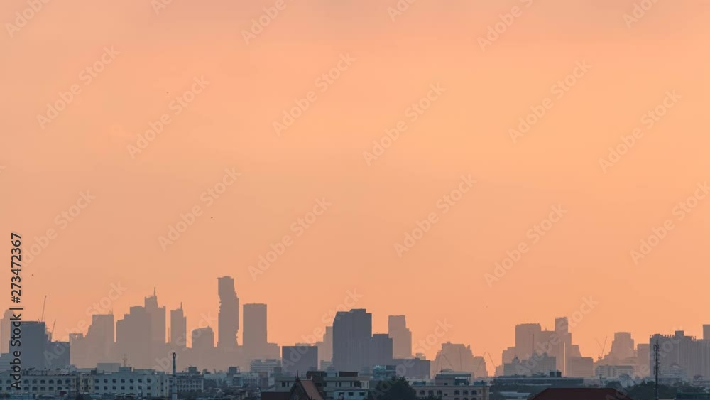 Time lapse, Orange on sky before sunset, At city scenery of Bangkok with building silhouette in thailand