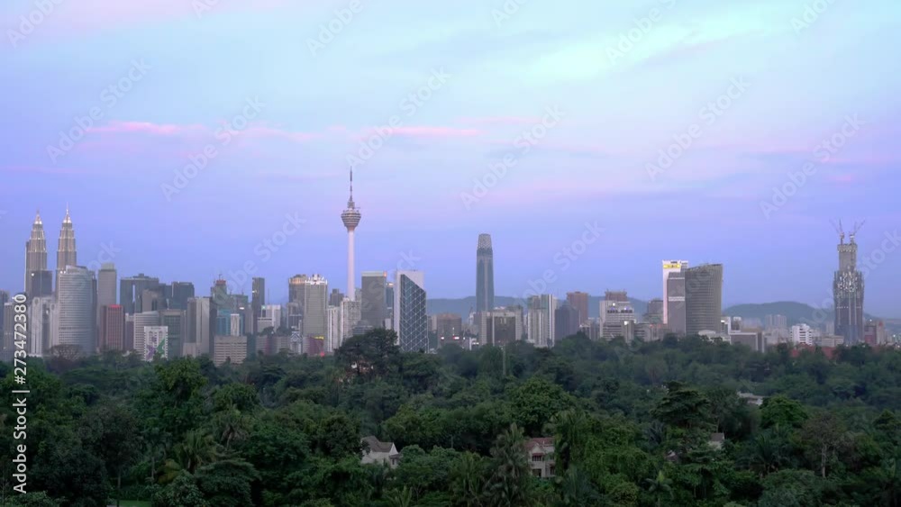 4k establishing b-roll cinematic shot of sunset scene at Kuala Lumpur city skyline. 