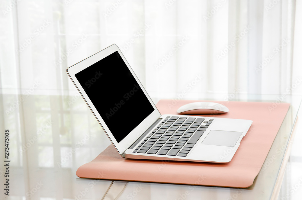 Desk Laptop with blank screen on table of coffee shop with white background . Desk Laptop with blank screen on table of coffee shop with white background .