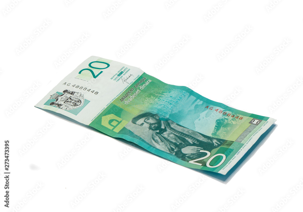 One banknote worth 20 Serbian Dinars with a portrait of the ruler of Montenegro Peter II Petrovich isolated on a white background One banknote worth 20 Serbian Dinars with a portrait of the ruler of Montenegro Peter II Petrovich isolated on a white background