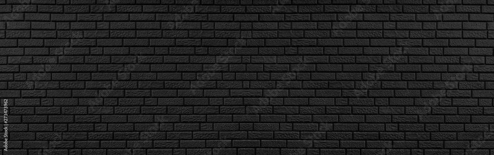 Panoramic texture of black brick wall, brickwork background for design or backdrop
