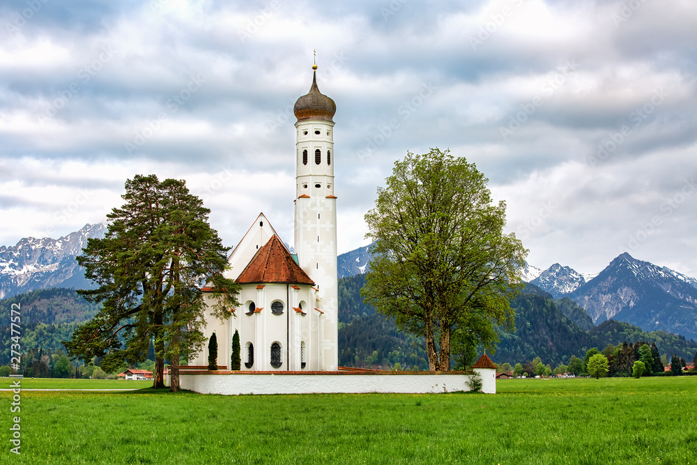 St. Coloman church in Bavaria, famous travel destination on overcast day