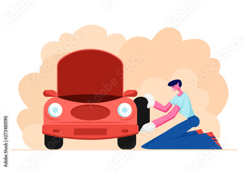 Mechanic or Driver in White Gloves Stand on Knees near Broken Car with Open Hood Holding Spare Wheel in Hands, Checking and Maintenance Auto, City Repair Service