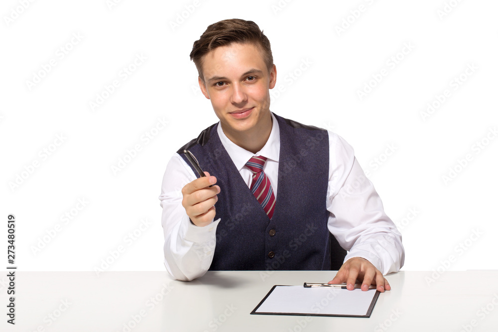 Smiling manager or businessman offers to sign a contract holding a pen and documents for signature Smiling manager or businessman offers to sign a contract holding a pen and documents for signature