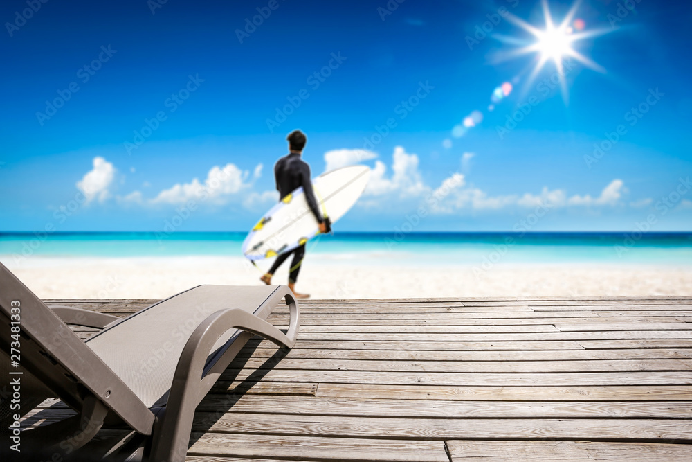 Summer sunbed on beach and free space for your decoration. Ocean landscape and sunny day. 