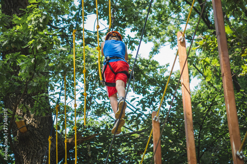 rope trail in the park adventure in the forest.