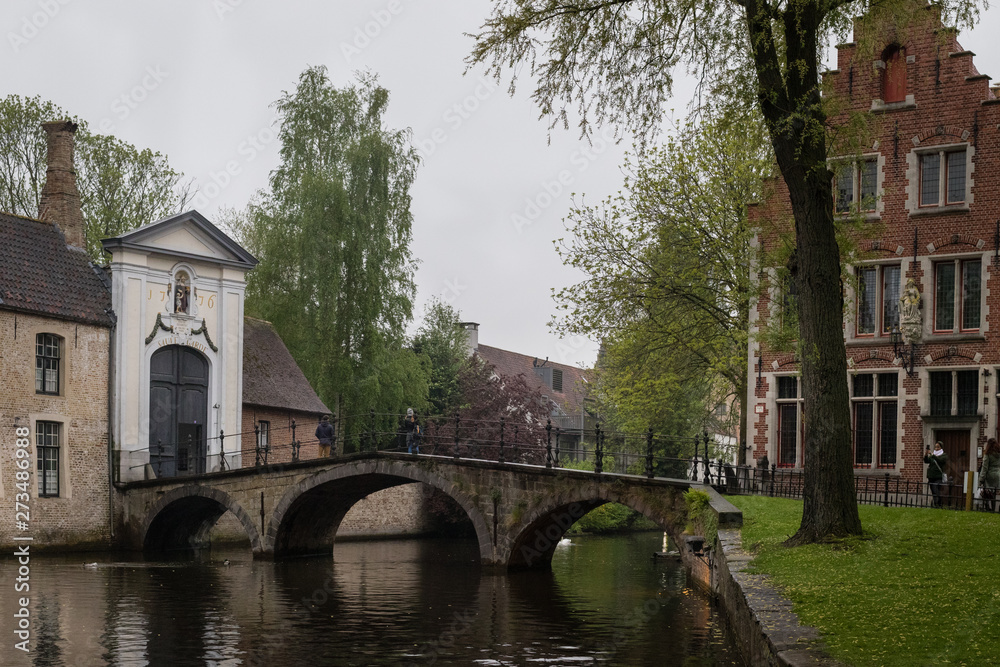 Cozy streets and beautiful architecture of Rainy Brugge, Belgium
