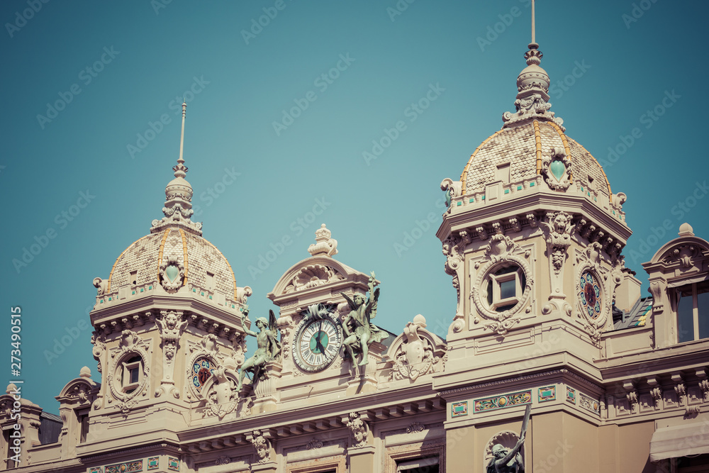 Obraz premium MONTE CARLO, MONACO - JUNE 04, 2019: Casino building facade in a sunny summer day in Monte Carlo, Monaco.