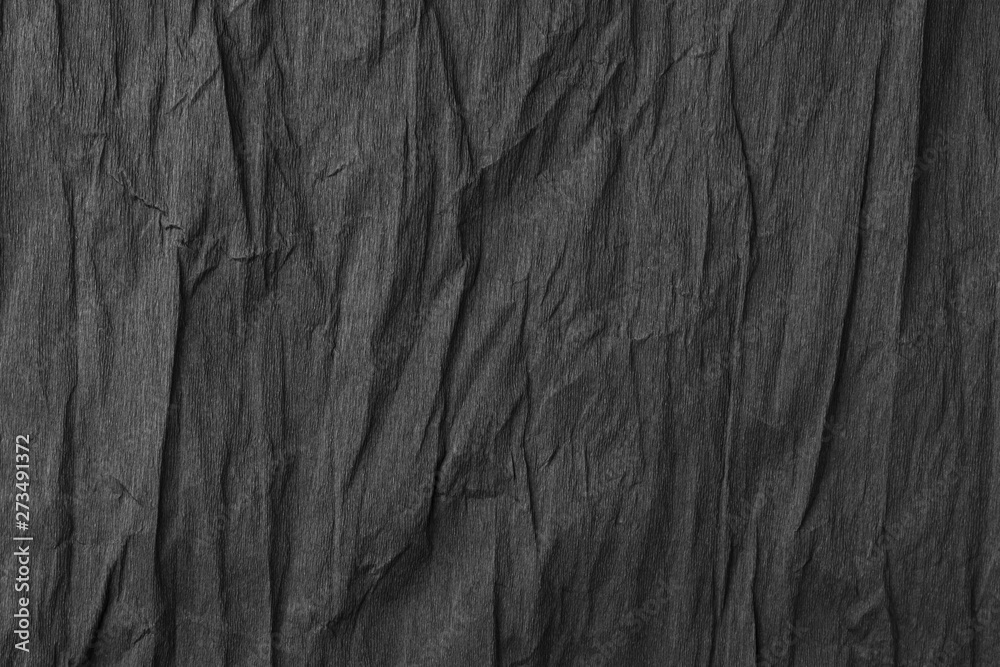 Black textured creased wrapping paper Black textured creased wrapping paper