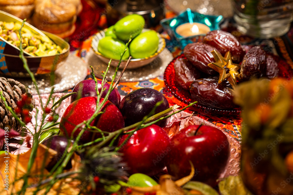 Close Up of Table decorated with Autumn and Winter Fruits and Edibles Close Up of Table decorated with Autumn and Winter Fruits and Edibles