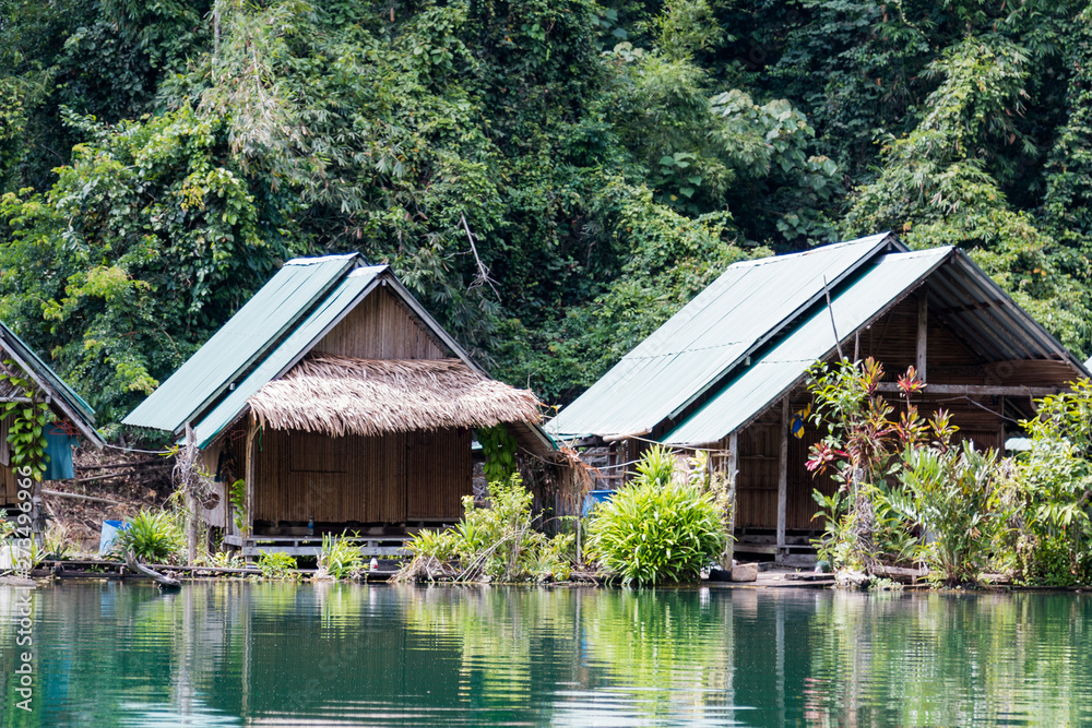 Tropical lakeside hut in ratchaprapa dam or Cheow Lan Dam Suratthani, Thailand. Tropical lakeside hut in ratchaprapa dam or Cheow Lan Dam Suratthani, Thailand.