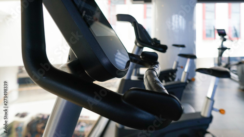 Exercise bikes and treadmills in the fitness center. Sport, fitness, health.Sports background.Healthy lifestyle concept