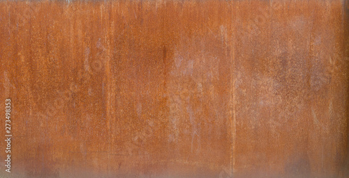 High resolution full frame background of a rusty and weathered old sheet metal plate texture.