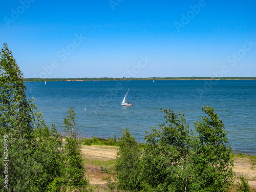 View from Lake Zwenkauer See in the south of Leipzig with wonderful blue waters