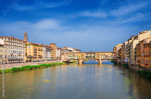 View of the famous Ponte Vecchio (Old Bridge) over River Arno in the historic center of Florence