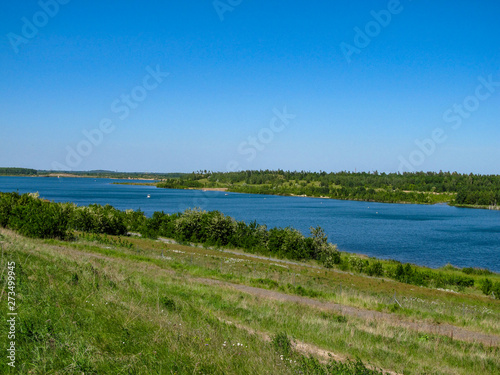 View from Lake Zwenkauer See in the south of Leipzig with wonderful blue waters