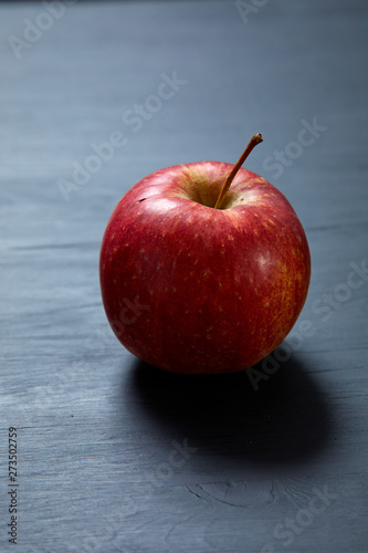 fresh apple on the black background