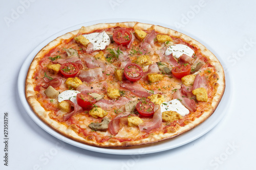 tasty pizza with bacon and cherry tomatoes