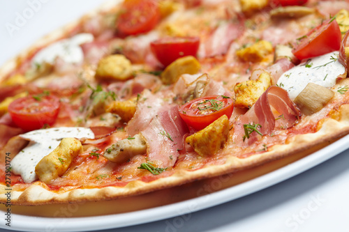 tasty pizza with bacon and cherry tomatoes