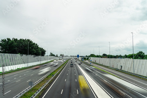 Traffic over the highway  motion blurred traffic  ring east A10  06 14 2019 Amsterdam the Netherlands  speedway  freeway fast