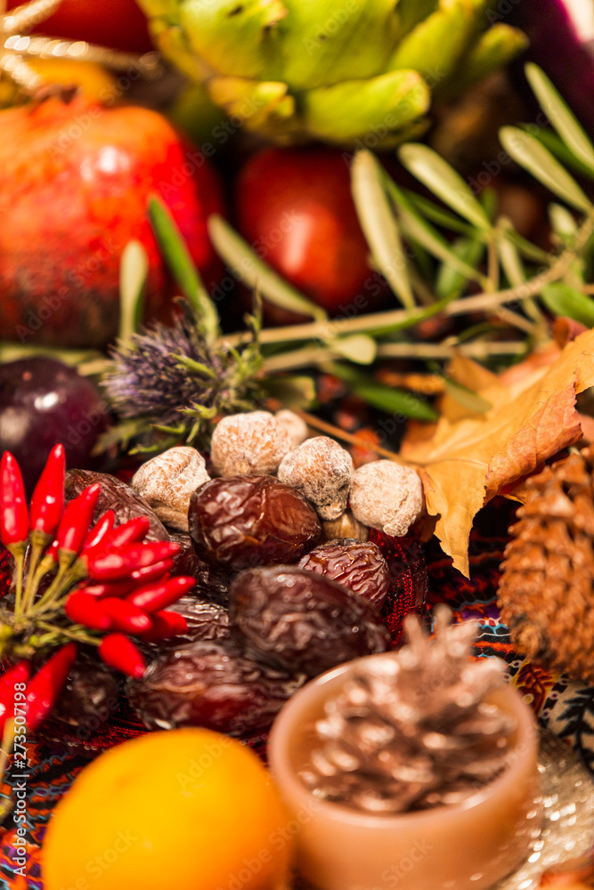 Close Up of Table decorated with Autumn and Winter Fruits and Edibles Close Up of Table decorated with Autumn and Winter Fruits and Edibles