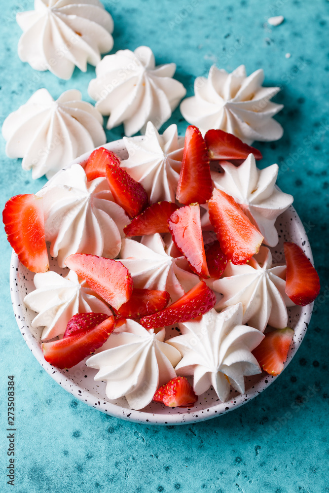 Vanilla meringues with strawberry. Summer dessert