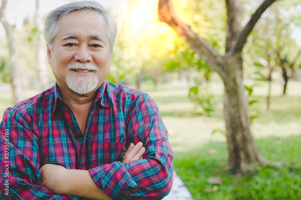 Portrait handsome elder man. Attractive handsome grandfather cross arms and proud of his self. Grandpa get successful of his business and his life. He is retirement age. His terminal is stable of life Portrait handsome elder man. Attractive handsome grandfather cross arms and proud of his self. Grandpa get successful of his business and his life. He is retirement age. His terminal is stable of life