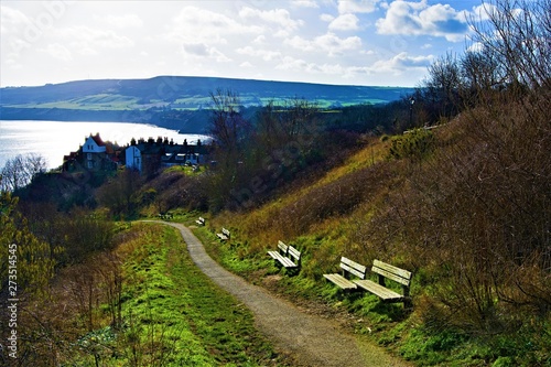 Late winter sunlit walkway at Robin Hood's Bay, North Yorkshire photo