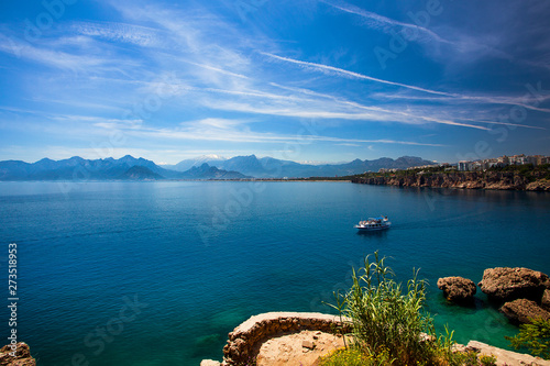Fototapeta Naklejka Na Ścianę i Meble -  Beautiful landscape of mountains and ship in the Mediterranean sea in Turkey, Antalya.