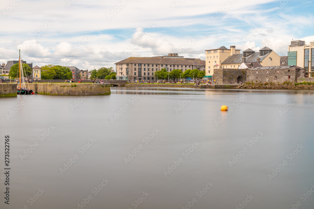 Fototapeta premium Park and buldings around Corrib River