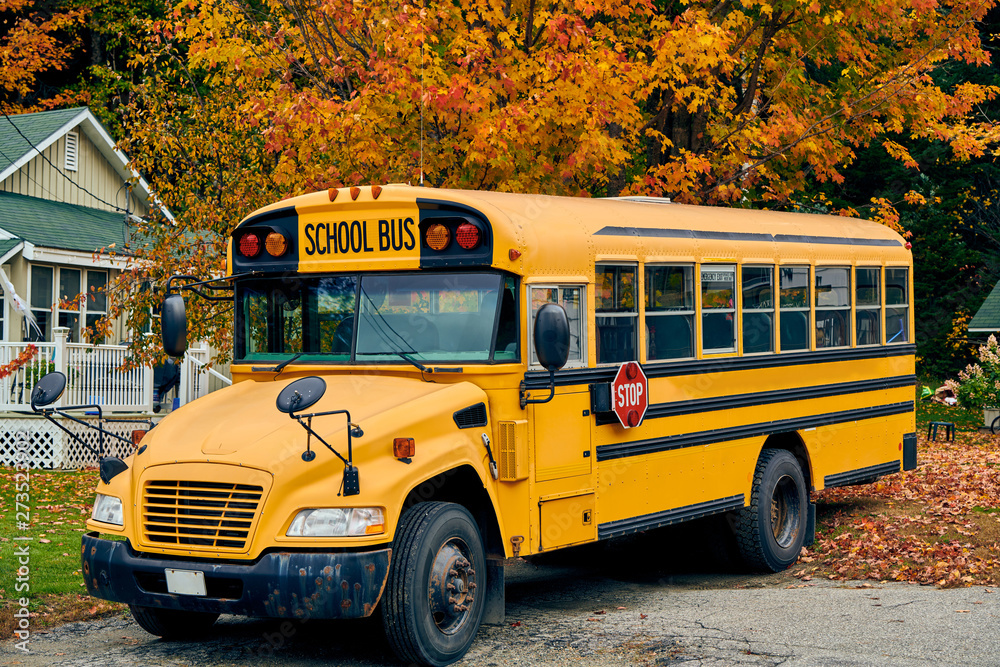 School bus on driveway at autumn, Maine, USA. School bus on driveway at autumn, Maine, USA.