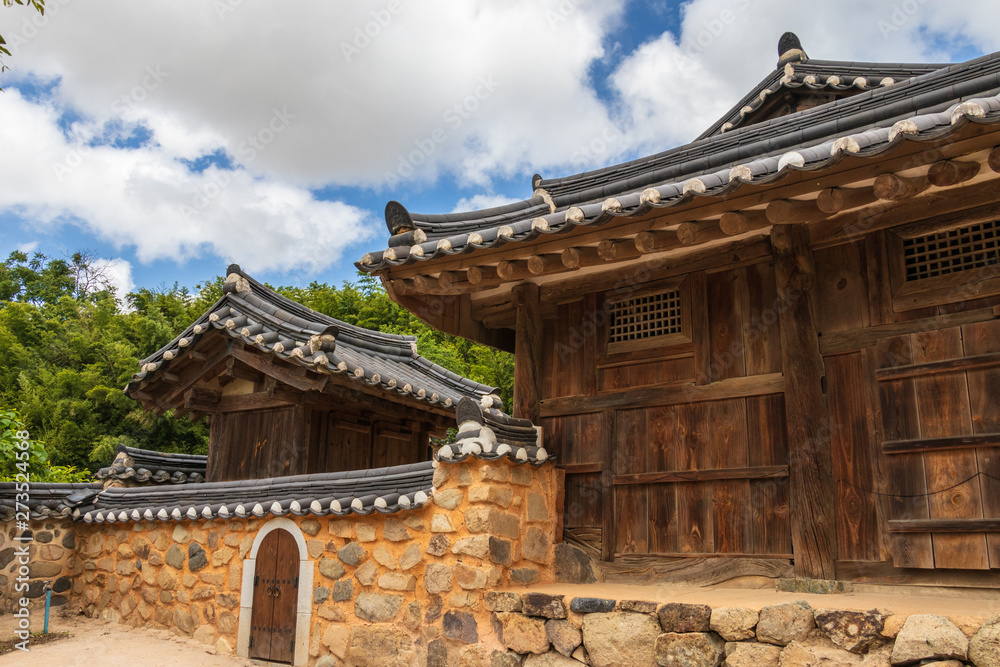 Korean traditional style building facade in Yangdong Folk Village in typical country side landscape. Gyeongju, South Korea, Asia.